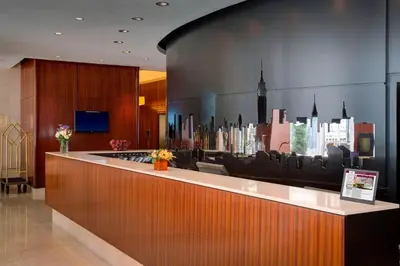 a lobby with a view of a city skyline at Residence Inn by Marriott New York Manhattan/Times Square in New York