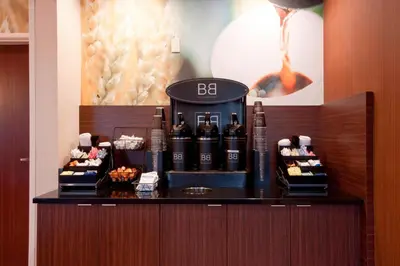 a bar with bottles of wine on a counter at Fairfield Inn Philadelphia Airport in Philadelphia