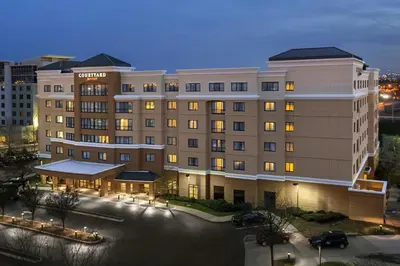 a rendering of a hotel building at night at Courtyard by Marriott Newark Elizabeth in Elizabeth
