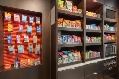 a grocery store with a display of food and drinks at Courtyard by Marriott Princeton in Princeton