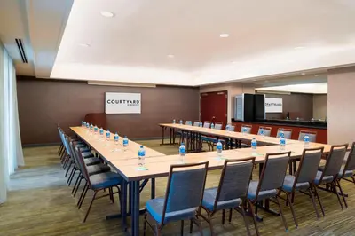 a large conference room with a long table and chairs at Courtyard by Marriott Princeton in Princeton