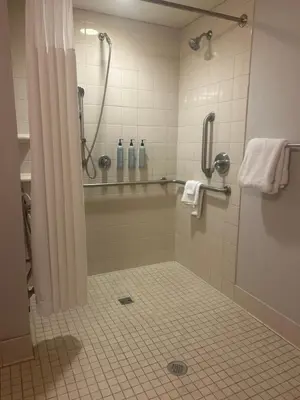 a bathroom with a shower with a shower curtain at Courtyard Bethlehem Lehigh Valley/I-78 in Bethlehem