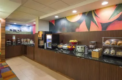 a breakfast counter in a hotel room with food at Best Western Allentown Bethlehem Lehigh Valley Inn & Suites in Bethlehem