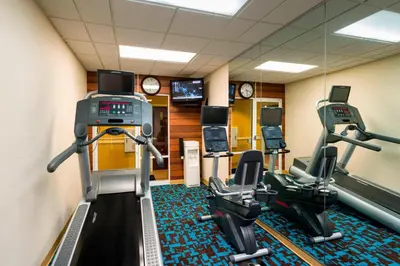 a gym with two treadmills and cardio machines at Best Western Allentown Bethlehem Lehigh Valley Inn & Suites in Bethlehem