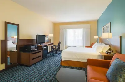 a hotel room with a bed and a television at Best Western Allentown Bethlehem Lehigh Valley Inn & Suites in Bethlehem