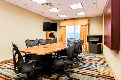 a conference room with a table and chairs at Fairfield by Marriott Wilkes-Barre in Wilkes-Barre