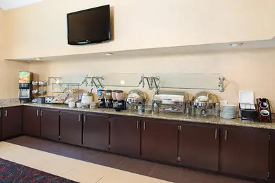 a kitchen with a counter with dishes on it at Residence Inn Binghamton in Vestal