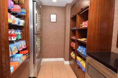 a walk in pantry with a refrigerator at Fairfield Inn by Marriot Binghamton in Binghamton