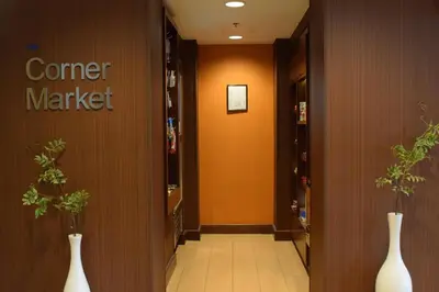 a hallway with two white vases in a store at Fairfield Inn by Marriot Binghamton in Binghamton