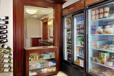 a refrigerator filled with lots of food and drinks at Residence Inn by Marriott West Orange in West Orange