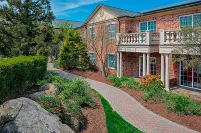 a brick house with a walkway in front of it at Residence Inn by Marriott West Orange in West Orange