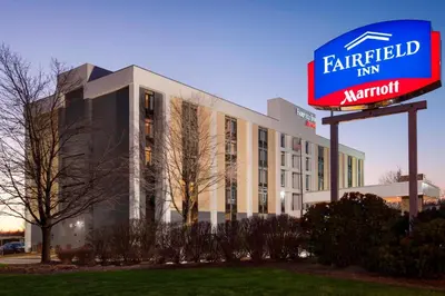 a large building with a sign in front of it at Fairfield Inn by Marriott East Rutherford Meadowlands in East Rutherford
