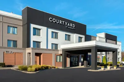 a rendering of a hotel with a building at Courtyard Newburgh Stewart Airport in Newburgh