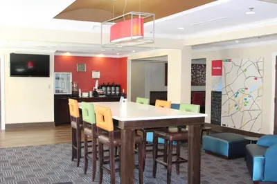 a dining room with a table and chairs at TownePlace Suites Wilmington Newark / Christiana in Newark