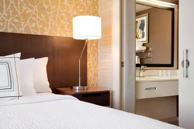 a hotel room with a bed and a sink at Fairfield Inn by Marriott Philadelphia West Chester/Exton in Exton