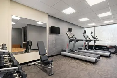 a gym with several treadmills and a mirror at Fairfield Inn by Marriott Philadelphia West Chester/Exton in Exton