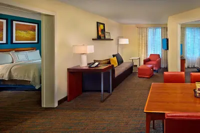 a hotel room with a bed and a living room at Residence Inn Philadelphia Conshohocken in Conshohocken