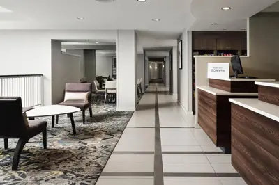 a hallway with chairs and tables in a building at Residence Inn Philadelphia Conshohocken in Conshohocken