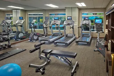 a gym with several rows of tread machines at Residence Inn Philadelphia Conshohocken in Conshohocken