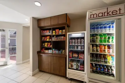 a store with a large refrigerator with drinks at Residence Inn Mt. Laurel at Bishop's Gate in Mount Laurel