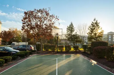a tennis court in a parking lot at Residence Inn Mt. Laurel at Bishop's Gate in Mount Laurel
