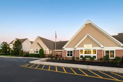 a row of houses on a street at Residence Inn Mt. Laurel at Bishop's Gate in Mount Laurel