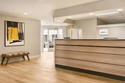 a waiting room with a counter and a bench at Residence Inn by Marriott Philadelphia West Chester/Exton in Exton