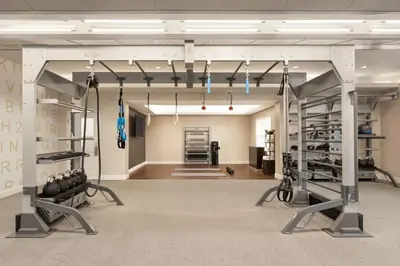 a gym with dumbbells and weights in a room at Residence Inn by Marriott Philadelphia West Chester/Exton in Exton