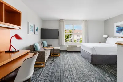 a hotel room with a bed and a desk at TownePlace Suites Philadelphia Horsham in Horsham