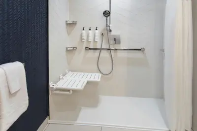 a bathroom with a shower with a shower curtain at Fairfield Inn & Suites by Marriott Somerset in Somerset
