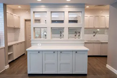 a large kitchen with white cabinets and sinks at Residence Inn by Marriott Princeton at Carnegie Center in Princeton