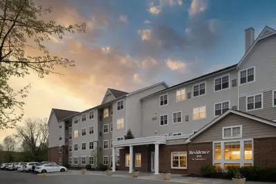 a rendering of the exterior of a hotel at Residence Inn Mount Olive At International Trade Center in Stanhope
