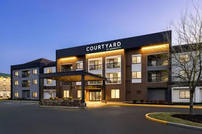 a building with a court yard sign in front of it at Courtyard Wilmington Brandywine in Wilmington