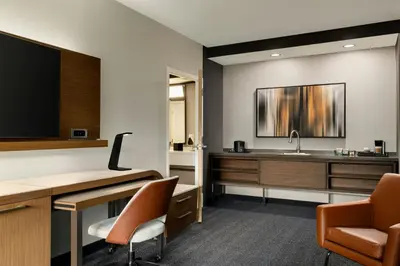 an office with a sink and a desk and chairs at Courtyard Wilmington Brandywine in Wilmington