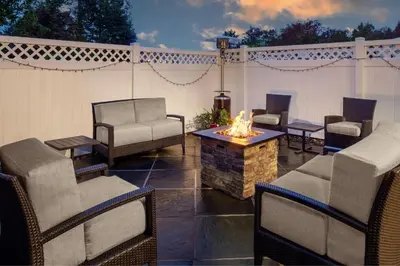 a patio with chairs and a fire pit at Residence Inn Cherry Hill Philadelphia in Cherry Hill