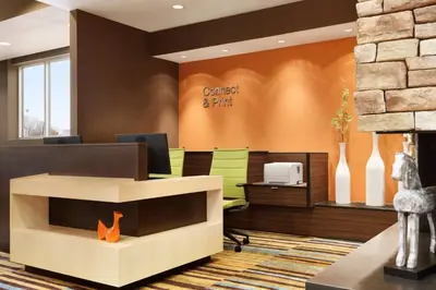 an office with a reception desk and a sign that reads guest and park at Fairfield Inn Philadelphia Valley Forge/King of Prussia in King of Prussia