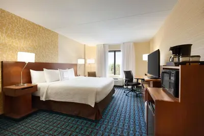 a hotel room with a bed and a desk and a television at Fairfield Inn Philadelphia Valley Forge/King of Prussia in King of Prussia
