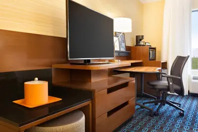 a hotel room with a desk with a television on it at Fairfield Inn Philadelphia Valley Forge/King of Prussia in King of Prussia