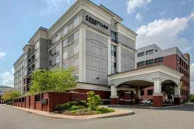 a building with a sign on the front of it at Courtyard Reading Wyomissing in Reading