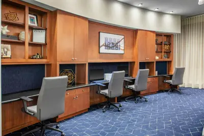 an office with desks and chairs in a room at Courtyard Reading Wyomissing in Reading