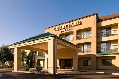 a hotel with a sign on the front of it at Courtyard by Marriott Scranton Montage Mountain in Moosic