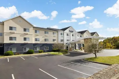 a large apartment building with a parking lot at Fairfield Inn by Marriott Scranton in Scranton