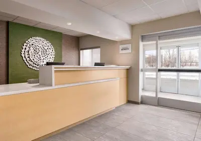 an office lobby with a reception desk and a window at Fairfield Inn by Marriott Scranton in Scranton