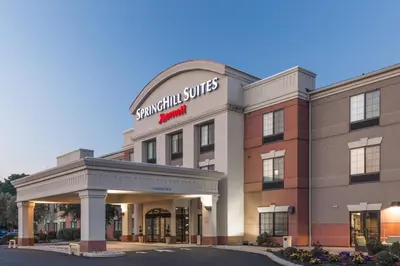 a rendering of the front of a savannah suites hotel at SpringHill Suites Quakertown Pennsylvania in Quakertown