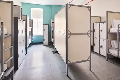 a row of lockers in a room at HI New York City Hostel in New York
