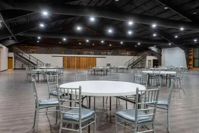 a large room with tables and chairs in it at Wyndham Lancaster Resort and Convention Center in Lancaster