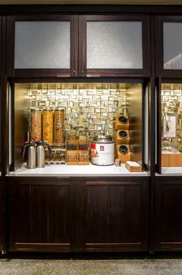 a display case in a kitchen with some food at Fairfield Inn & Suites by Marriott Philadelphia Downtown/Center City in Philadelphia