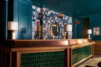 a counter in a room with blue walls at Freehand New York in New York