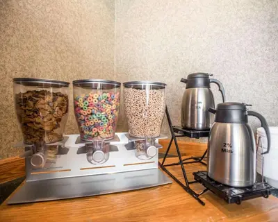 a group of three blenders sitting on a counter at Quality Inn New Columbia-Lewisburg in New Columbia