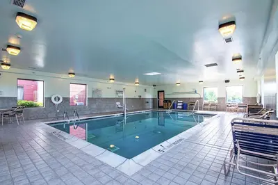 a large swimming pool in a large room at Hampton Inn Pine Grove in Pine Grove